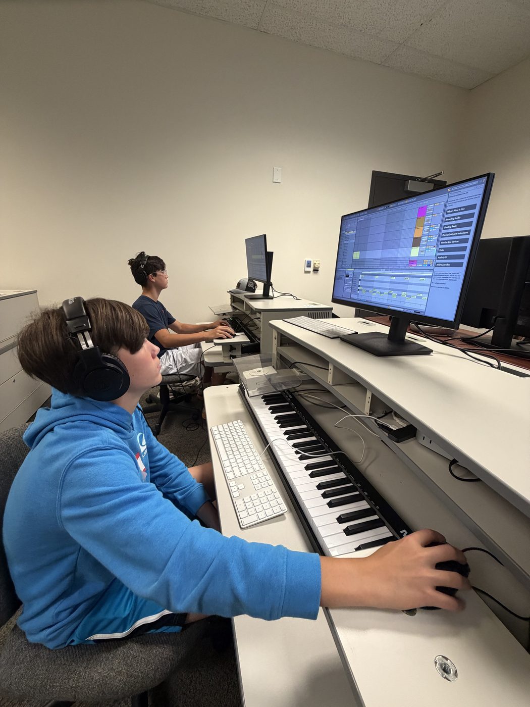 Teens producing music at LOUPZ Beat Lab