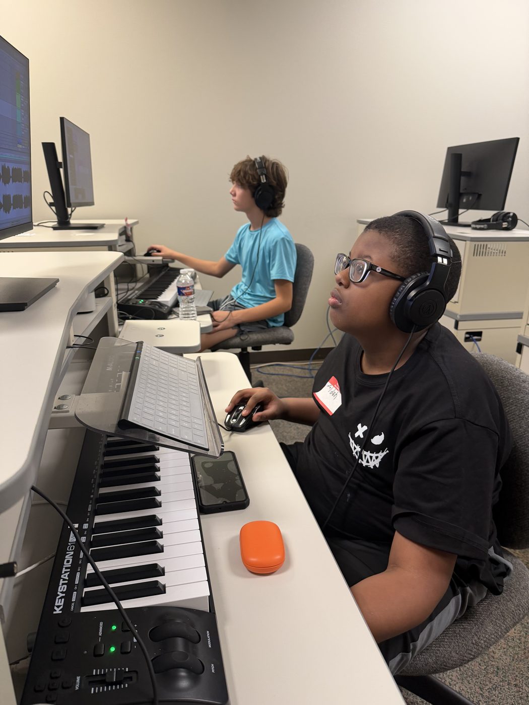 Students producing beats together at LOUPZ Beat Lab